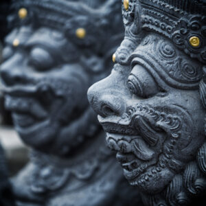 Gardian statue at the Bali temple entrance Indonesia